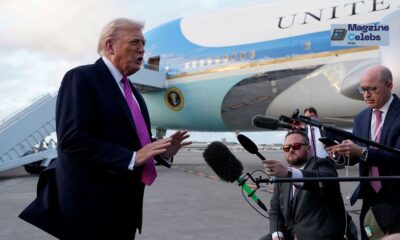 President Donald Trump speaks to reporters on an airport tarmac, with Air Force One visible in the background.