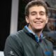 A portrait of American Chess Grandmaster Daniel Naroditsky, known for his popular online chess streams and educational content.