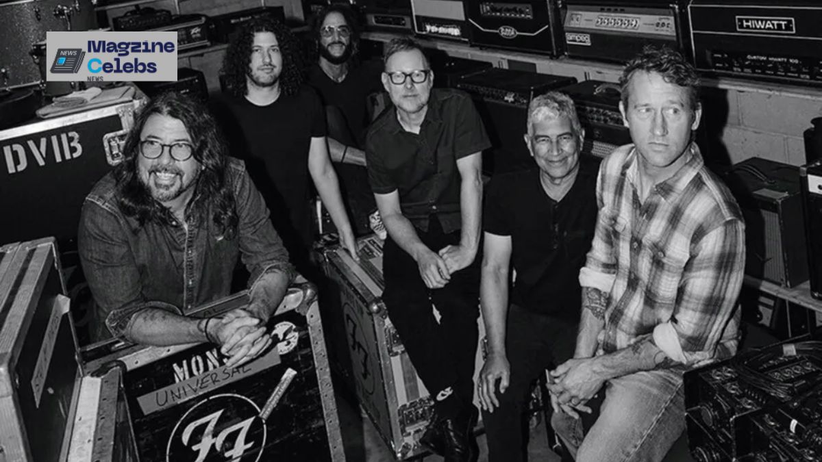 The members of Foo Fighters, including Dave Grohl, backstage with their equipment cases.