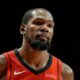 Kevin Durant in his Houston Rockets jersey, looking focused before his return game in Oklahoma City.