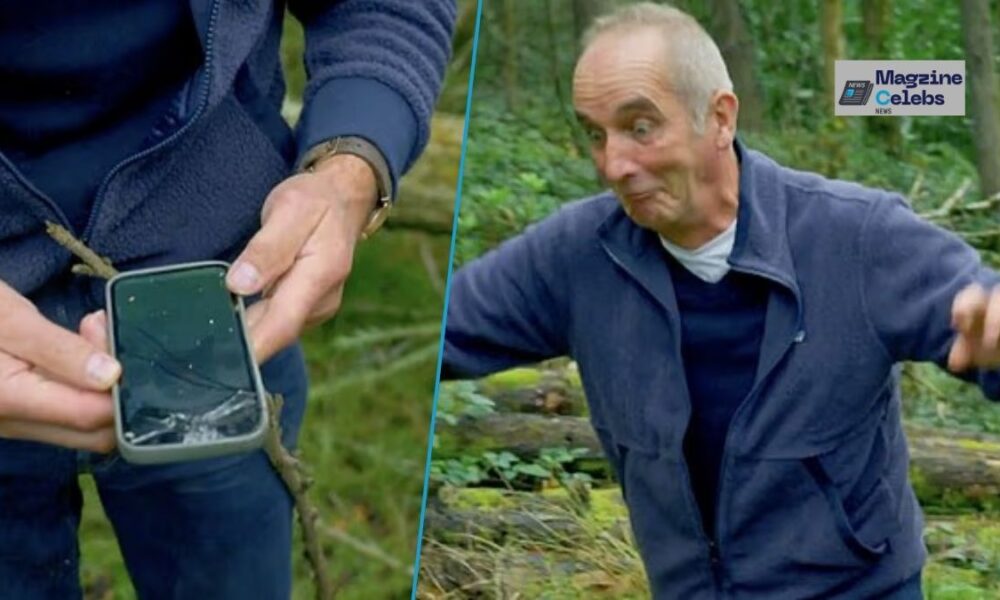 Kevin McCloud reacts after his phone is crushed by a falling tree branch during Grand Designs filming