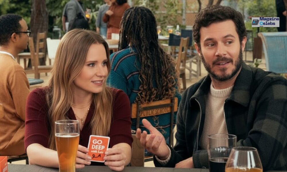 Bell and Adam Brody in a scene from the Netflix series 'Nobody Wants This', sitting at a table.